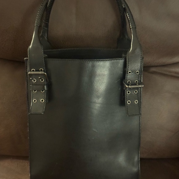 Authentic Yves Saint Laurent  Leather Grommet Detail Shoulder Handbag Black. - Picture 3 of 14